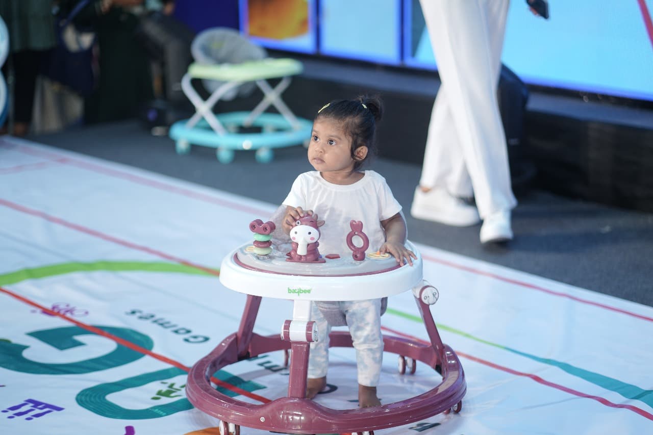 Baby smiling during event